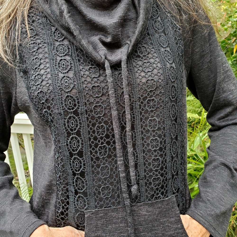 Black Large, nicely fitted shirt with lots of style.